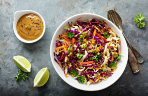 Asian Kale Slaw with Ginger Peanut Dressing Asian cole slaw with sesame and peanut butter dressing