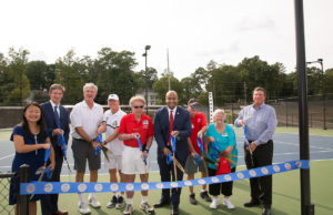 Bitsy Grant Tennis Center’s New Hard Courts Honor Longtime Employee The ribbon-cutting ceremony for the new Bitsy Grant courts.