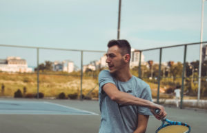 Is Your Tennis Pro Certified and Why Should You Care? Tennis coach on the court