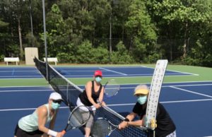 ALTA is Back Judie Fuller and her team on court, wearing safety masks.