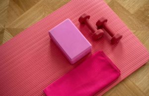 The Kinetic Chain: Keeping You Moving On The Court In All Directions yoga mat and small hand weights