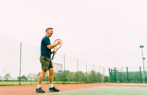 How To Turn Pre-Match Nerves Into Excitement Tennis player celebrating hitting a winning shot.
