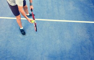 Make That Adjustment Tennis Sport Racket Racquet Athlete Match Concept