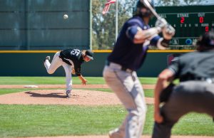What Can Tennis Players Learn From Baseball? Mens' baseball pitcher throwing the curveball to the batter.