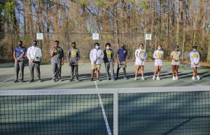 Giving For The Greater Good Southwest DeKalb High School tennis team members.