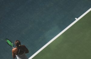 Customer Service: How Would You Rate Yourself? Female tennis player at the baseline