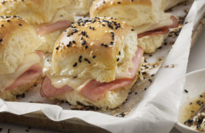 Baseline Bites Baked Ham And Swiss Sliders on White Tray Buns