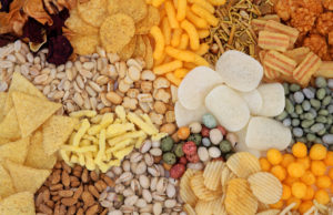 Tailgating Season Is In Full Swing Savory snack food selection forming an abstract background.