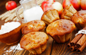 Paleo Apple Muffins Apple muffins with cinnamon on the table