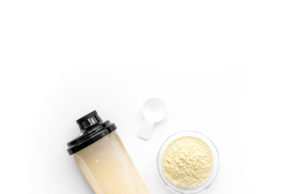Sport Nutrition Approaches For Your Power Tennis Protein powder mixture and a large sports bottle