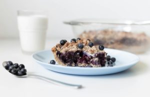 Blueberry Pie A slice of blueberry pie and a glass of milk