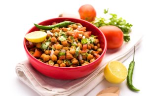 Avocado Chickpea Chaat Black Chickpea Chaat or Kala Chana Chat recipe is a popular snack recipe from India, served in a bowl. selective focus