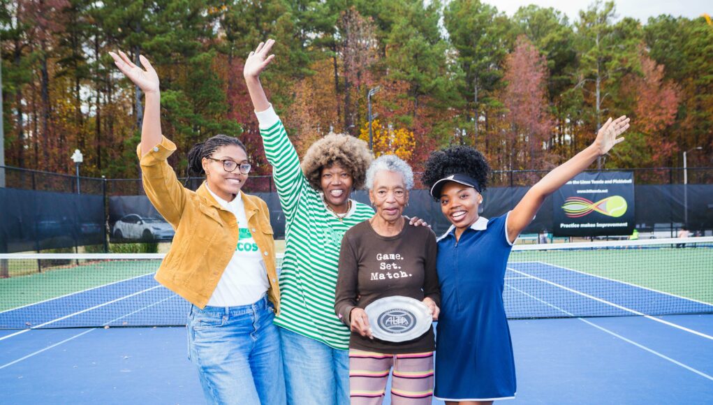 Serving Above And Beyond L-R: Ryleigh Harris, granddaughter; Euodia Harris, mother; Anne Rambo, grandmother; and Kennedi Harris, granddaughter. Anne is a 50+ season captain and encouraged her granddaughters to play tennis. Not pictured is granddaughter, Avery Harris, who has also been an ALTA City Champion.