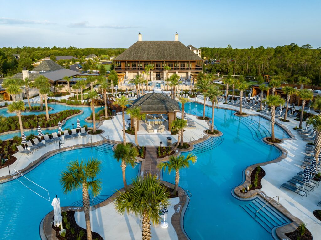 This expansive facility features a resort-style family pool with a waterslide and lazy river, zero-entry activity pool, adults-only lap pool, hot tub, and more. 