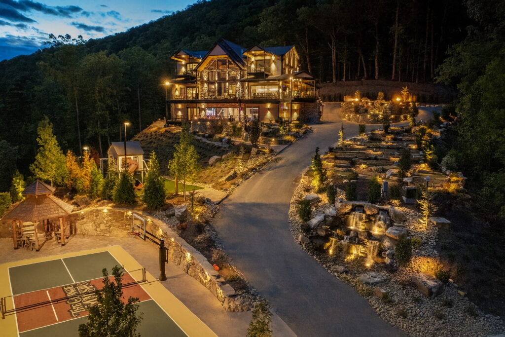 Experience the pinnacle of luxury, comfort, and family fun in this one-of-a-kind mountaintop estate located in The Summit at Bluff Mountain, just minutes from Pigeon Forge and Gatlinburg.