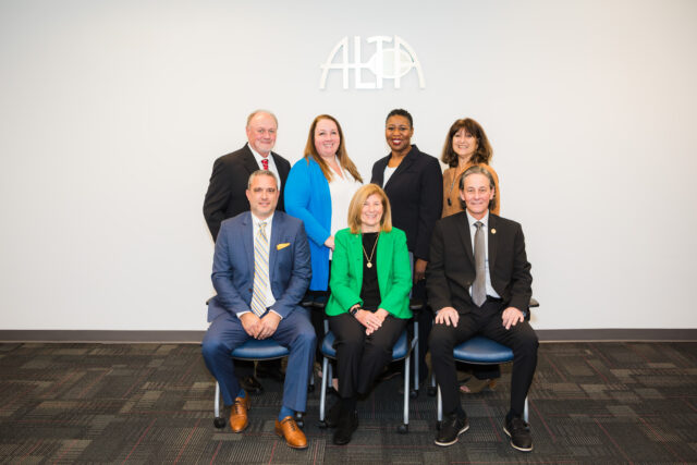 Back row, L-R: Steven Thomas, Cameron Turner, Chequetta Allen, and Rita Maloof. Front Row, L-R: Greg McAfee, Linda Shepherd, and David Rowe. Not pictured: Terry Godbold and Karen Sullivan.