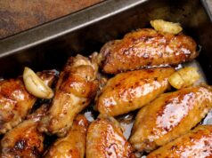 Garlic Honey Wings Fried sharply spicy chicken wings on a baking