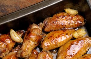 Garlic Honey Wings Fried sharply spicy chicken wings on a baking