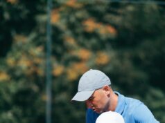 A Wonderful Tennis Experience Tennis instructor with young boy in tennis training lesson