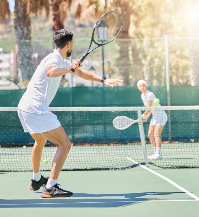 Tennis, man and woman training for fitness as a couple outdoors in a game or practice match in summ.