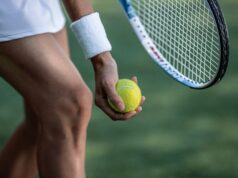 Serving Strong: What ALTA Members Should Know About Protecting Their Knees and Hips Tennis player in sportswear with a ball close-up