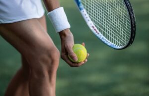 Serving Strong: What ALTA Members Should Know About Protecting Their Knees and Hips Tennis player in sportswear with a ball close-up