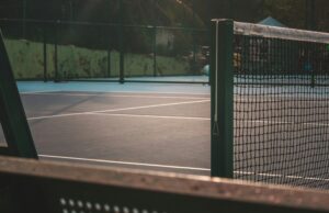 Good Question: July/August 2026 Tennis court lit up at night