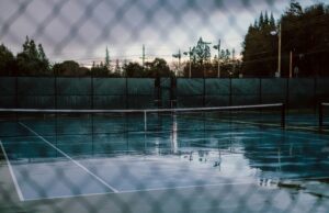 When Will The Courts Be Playable? rain-soaked tennis court
