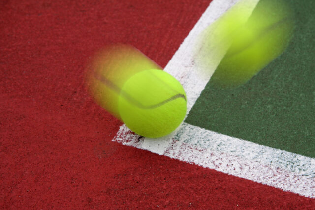 Tennis Ball on the Line