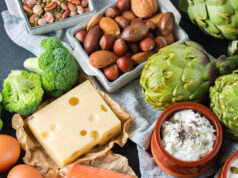Protein Power For Racquet Sports Assortment of healthy protein source and body building food. Meat beef salmon chicken breast eggs dairy products cheese yogurt beans artichokes broccoli nuts oat meal. Top view flat lay